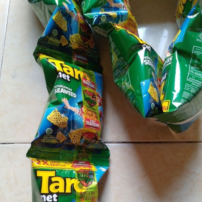 

MAKANAN RINGAN SNACK TARO NET 17g RENCENG ISI 10 PCS BUNGKUS