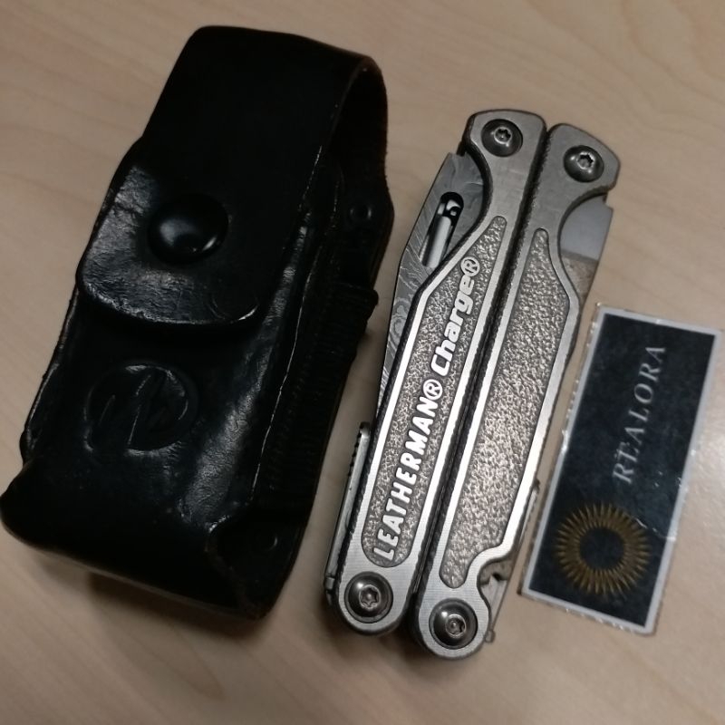 Leatherman Charge tti multitool older version with Damascus blade not ZT benchmade civivi