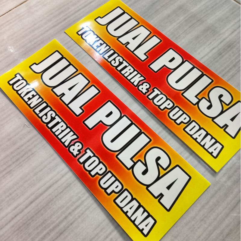 

Stiker JUAL PULSA ukuran 9x28cm Bahan vinyl laminasi dingin