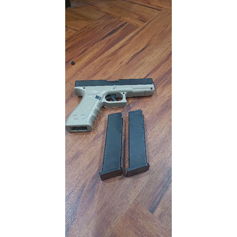 Mainan Glock Auto Nerf Shell Eject Tan