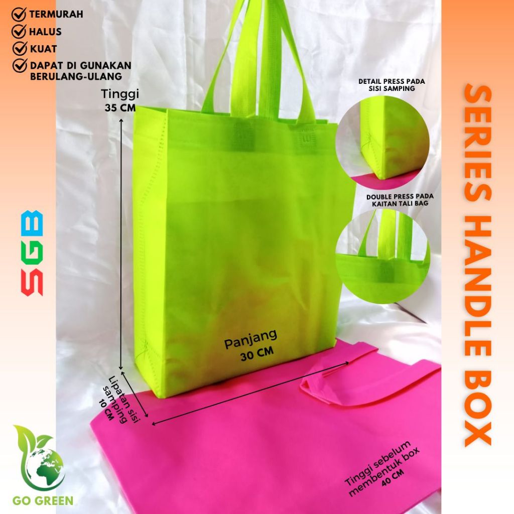 

Tas Spunbond Handle Box uk 30x40x10 / Goodie Bag / Tas Kain Polos