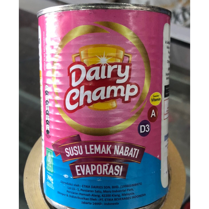 

SUSU EVAPORASI DAIRY CHAMP KALENG