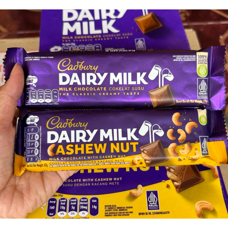 

agen distributor makanan ringan snack cemilan ultah anak cokelat cadbury dairy milk chocolate cashew nut 62g murah ukuran sedang