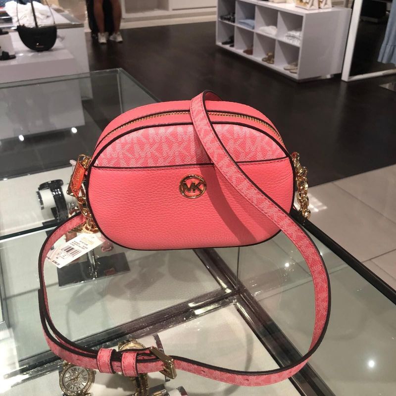 MK SM FRNTPKT OVAL XBODY TEA ROSE