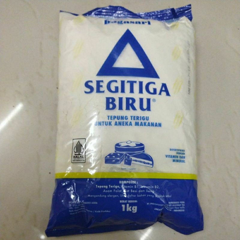 

Segitiga biru tepung terigu protein sedang kemasan 500gr & 1 kg