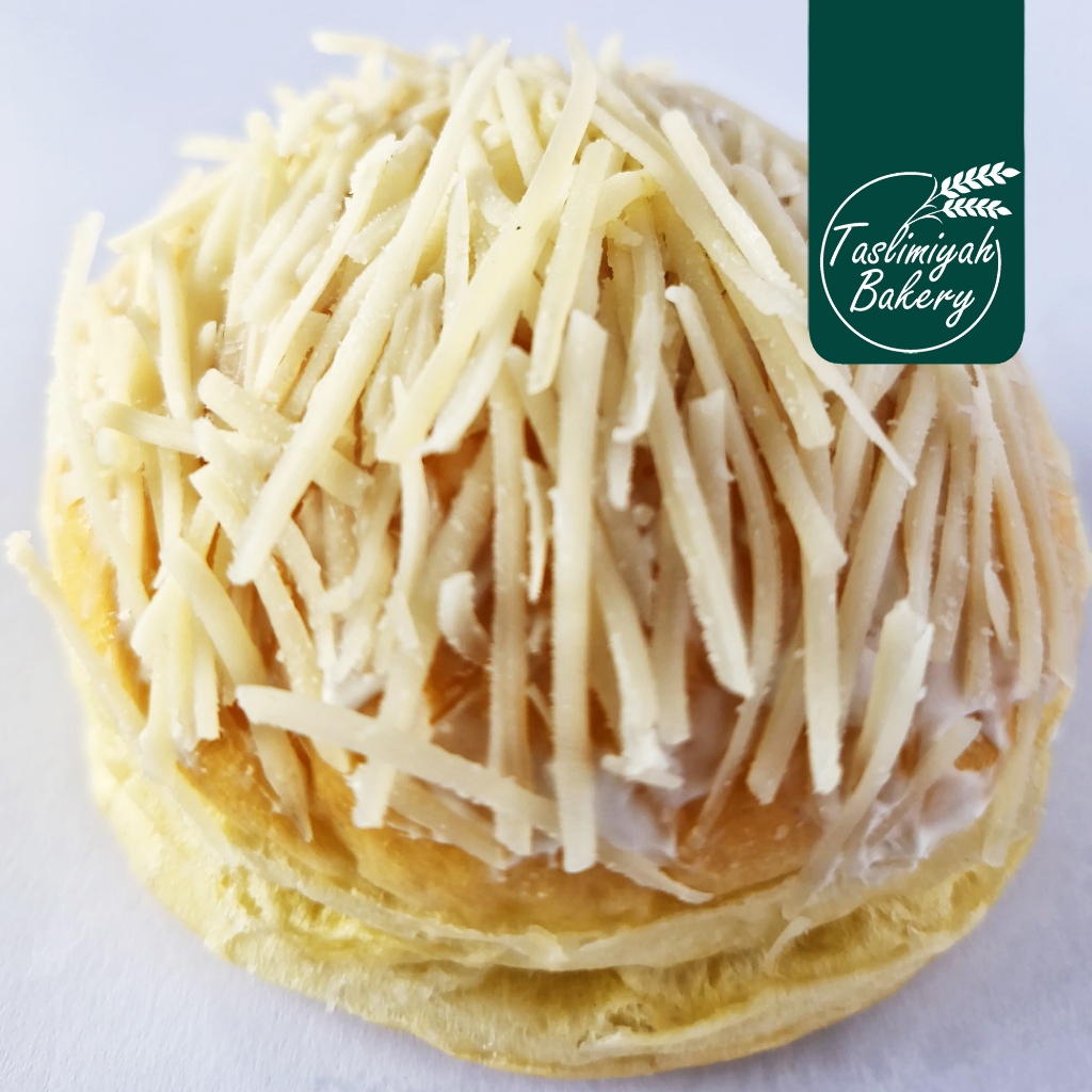 

Cheese bread / roti isi & topping keju lumer ukuran medium - Taslimiyah Bakery