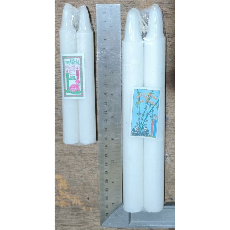lilin putih besar. lilin putih kecil.