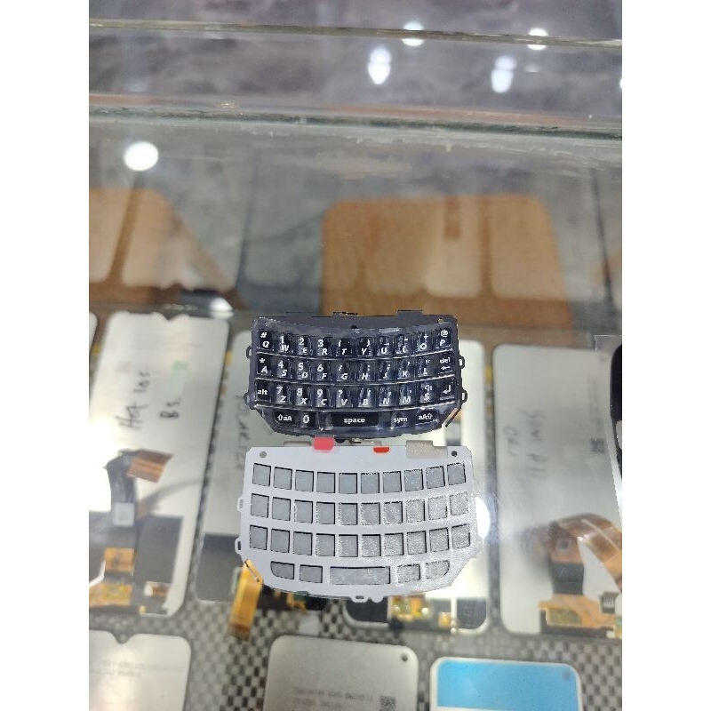 Tombol bawah BB 9800/torch