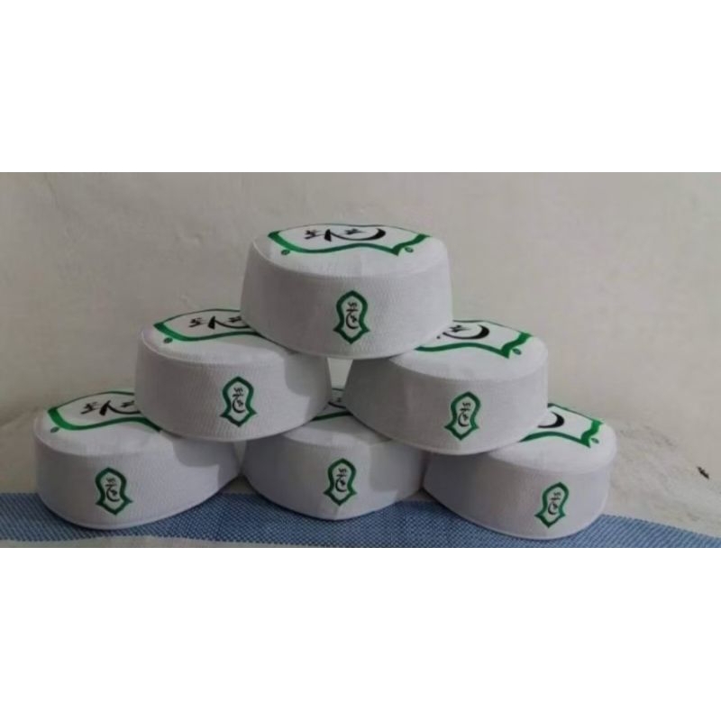 kopiah/peci terompah putih dan hitam