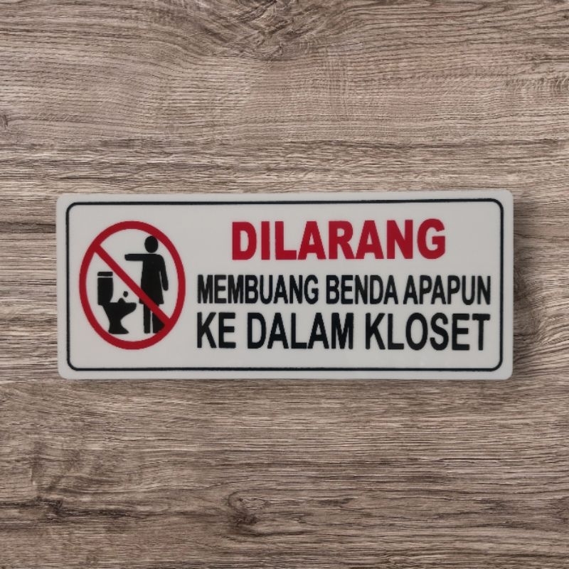 

Akrilik sign board DILARANG MEMBUANG BENDA APAPUN KEDALAM KLOSET 22×9cm