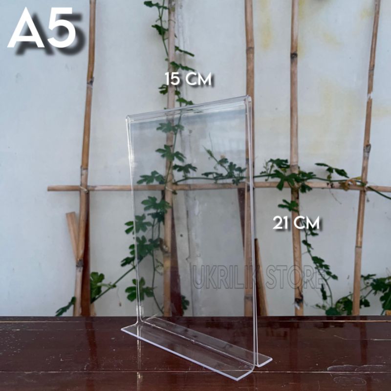 

Akrilikk Bening Transparan Tempat Brosur Qris Barcode A5 21 x 15 cm tebal 2mn