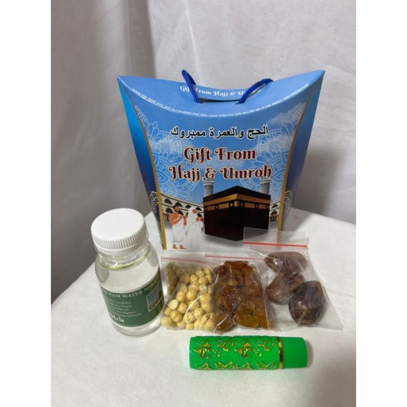 

Ssl09 oleh oleh haji dan umroh Paket Tas Jingjing 50pcs Lengkap( air zam zam 80ml Ful)