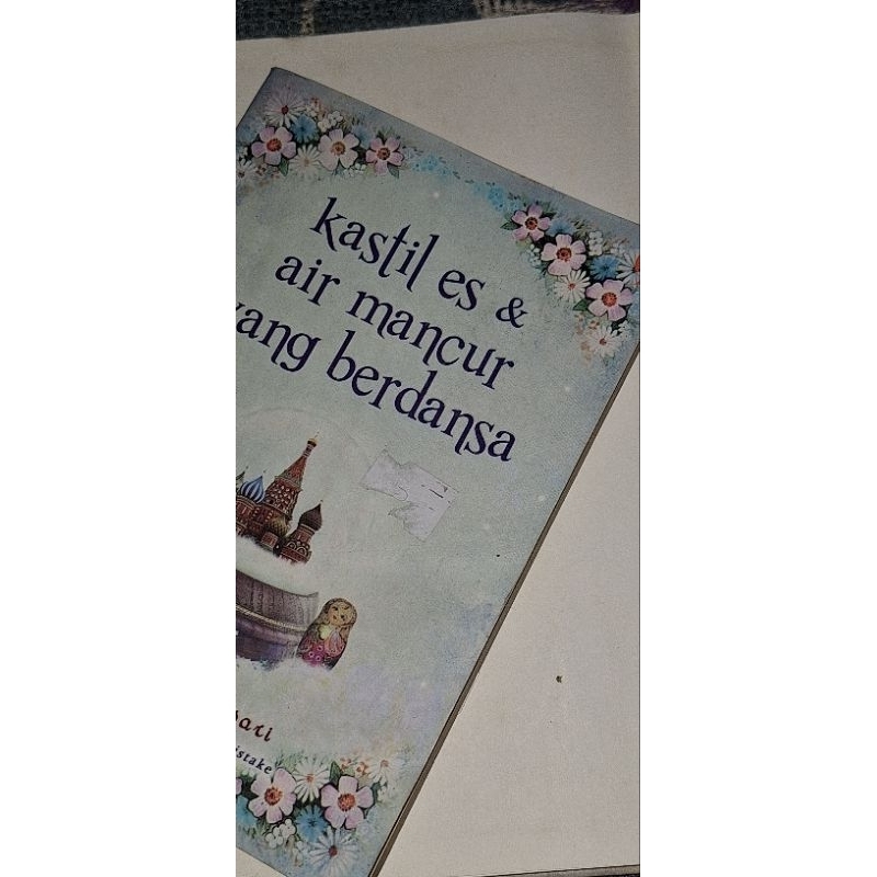 buku kastil es dan air mancur yang berdansa