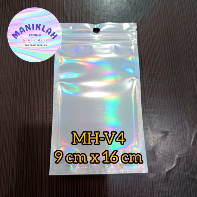 

( Minimal pembelian 10 lembar ) Plastik Klip Corak Hologram ( MH V1 ~ V9 )