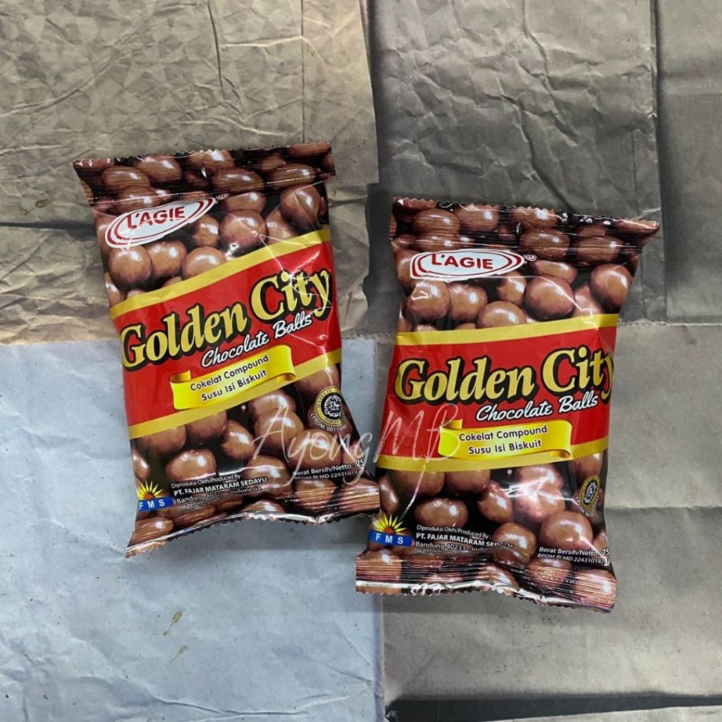 

GOLDEN CITY CHOCOLATE BALLS 75GR / COKLAT SUSU ISI BISKUIT