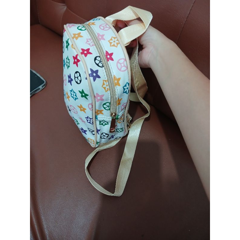 

Tas Selempang Motif Warna-warni
