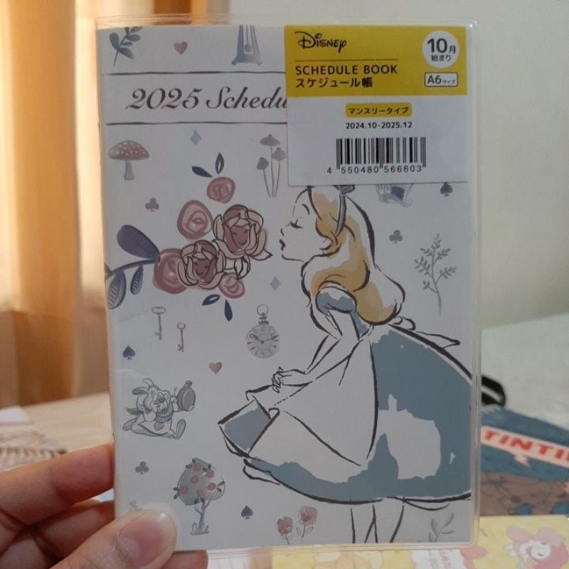 

Agenda Planner Disney Alice in Wonderland 2025 Schedule Book.