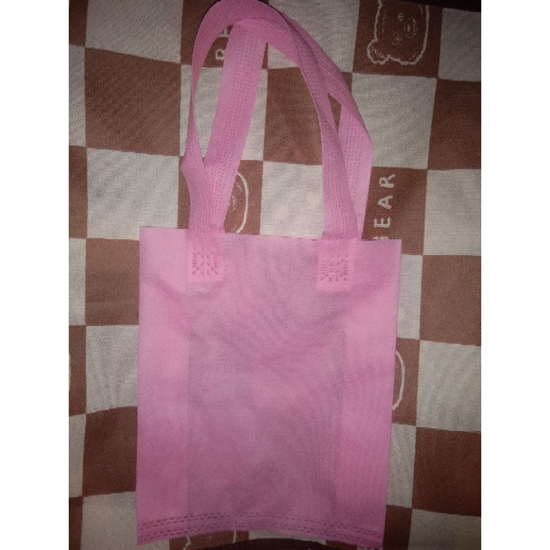 

Goodie bag tas kain spunbond pink tas belanja dan souvenir