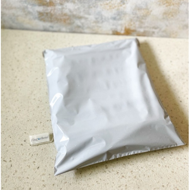 

POLYMAILER POLOS PUTIH BEIGE GLOSSY 30x40CM READY