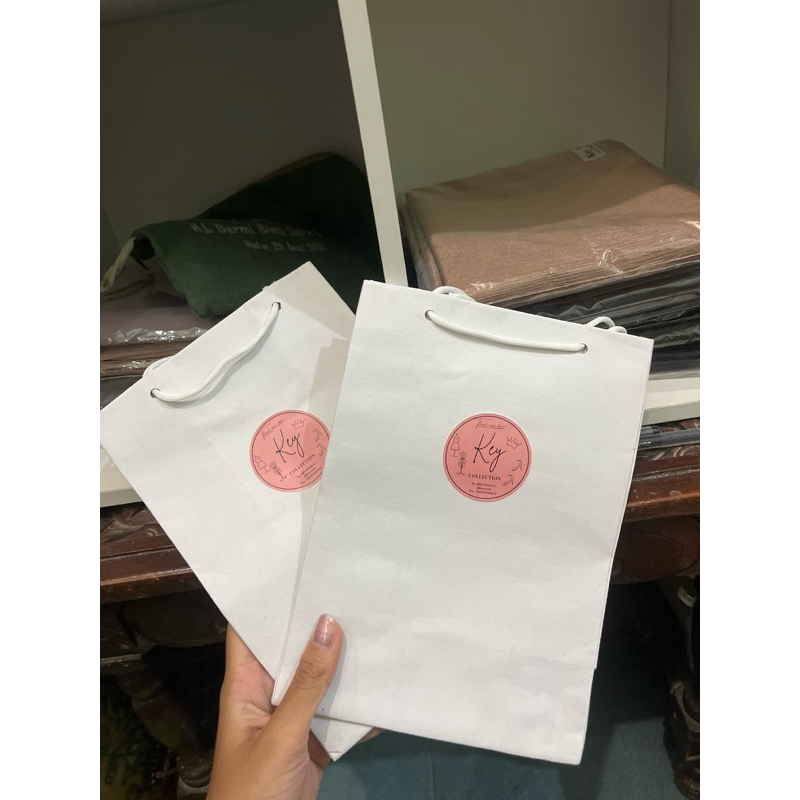 

paper bag key hijab