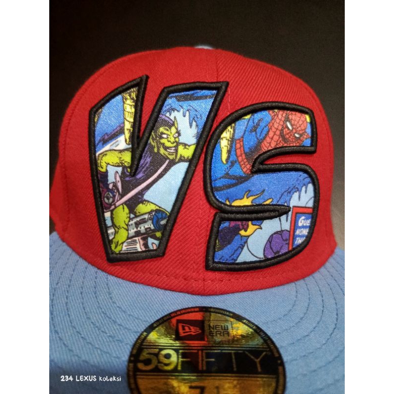topi NewEra VS, fitted ORIGINAL goblin VS spiderman furing bergambar comic- 7 1/2 (59.6cm)