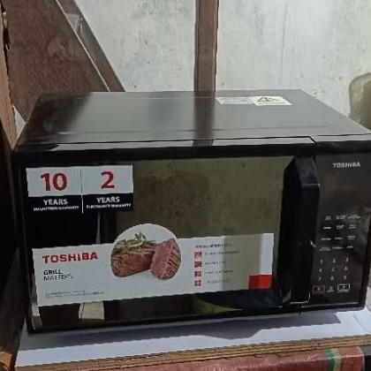 Preloved Microwave oven toshiba