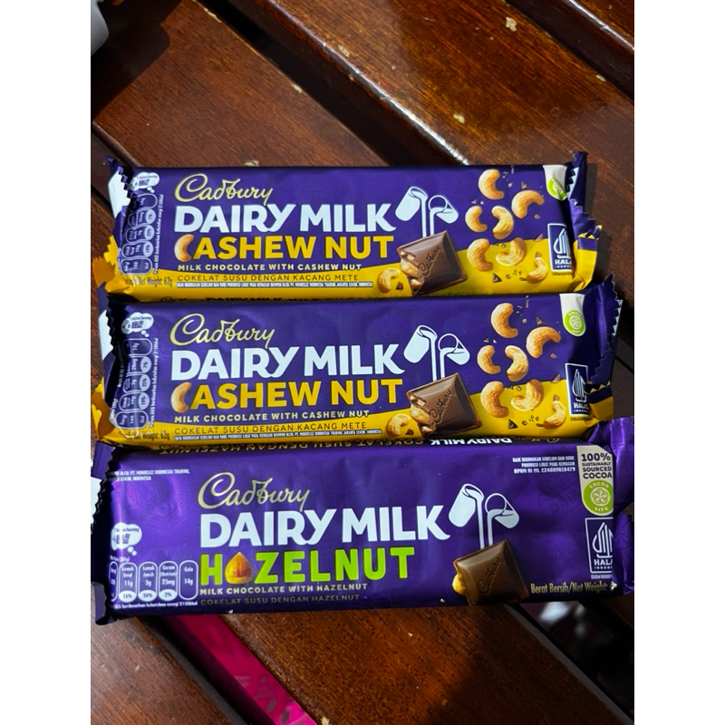 

Cadbury Dairy Milk Cashew Nut - Cadbury dairy milk Hazelnut 62gram - Coklat Cadbury Kacang mete 62gram