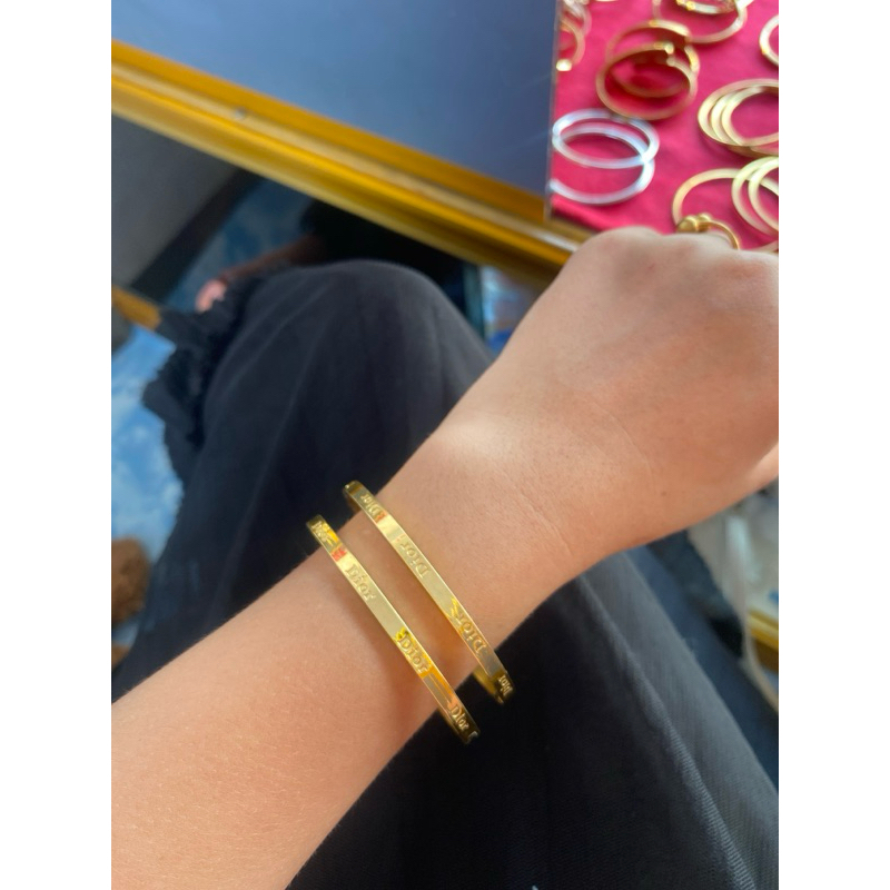 gelang dior titanium