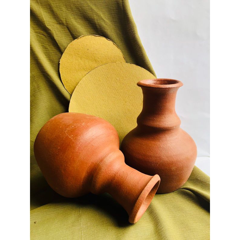 kendi vas tanah liat