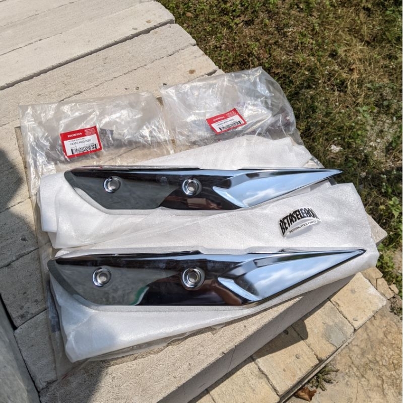 COVER KNALPOT HONDA REVO FI ORIGINAL