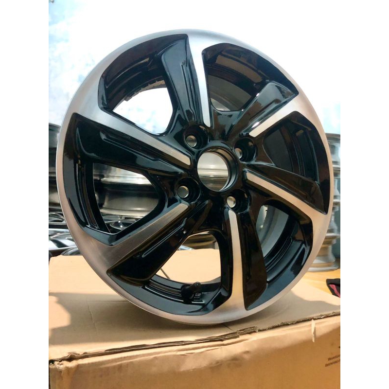 velg serep new brio satya R14 PCD 4/100 kondisi bekas masih bagus