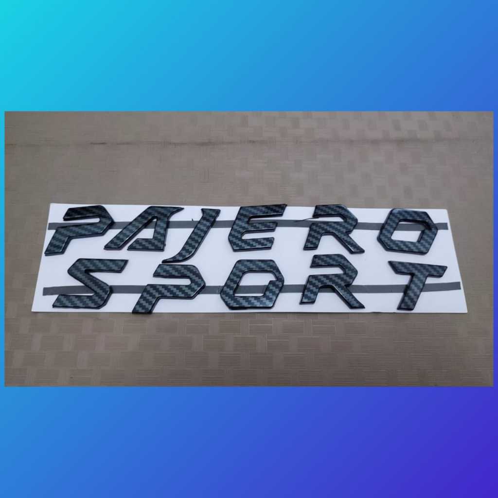 emblem kap mesin tulisan pajero sport warna carbon