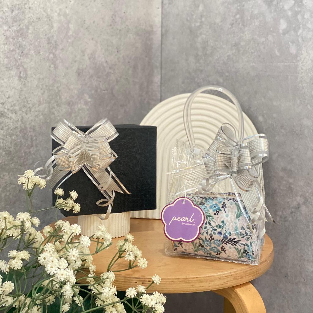 

Hampers Box dan Tas Transparan untuk Mukena Pearl