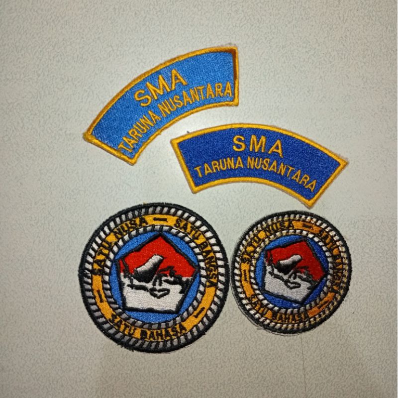 Bordiran logo SMA Taruna Nusantara (Tarnus/TN) tersedia bordiran seragam, bordiran baret, dan bordir