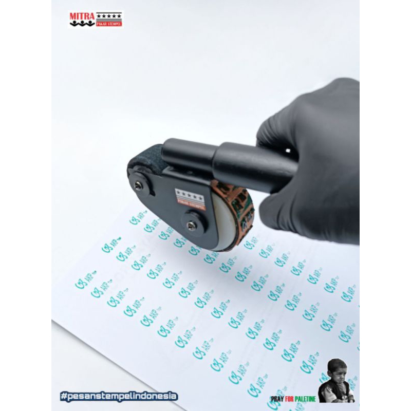 

Stempel Roll Anti Luntur desain Custom uk maksimal 10x2 cm
