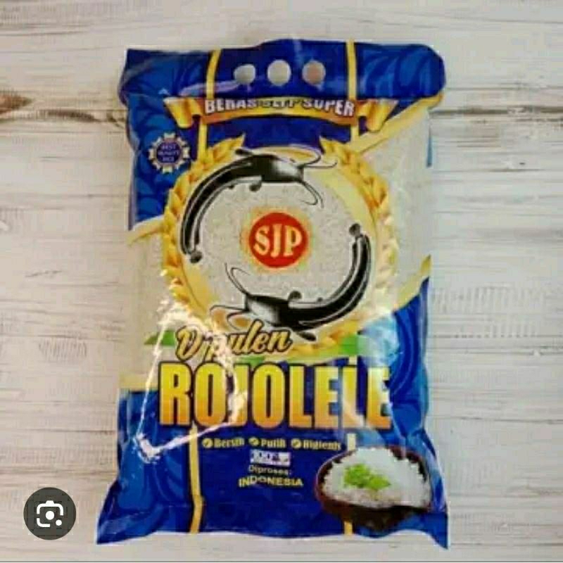 

Beras Rojo Lele SJP kemasan 1 kg / Beras Rojolele D'pulen 1 kg