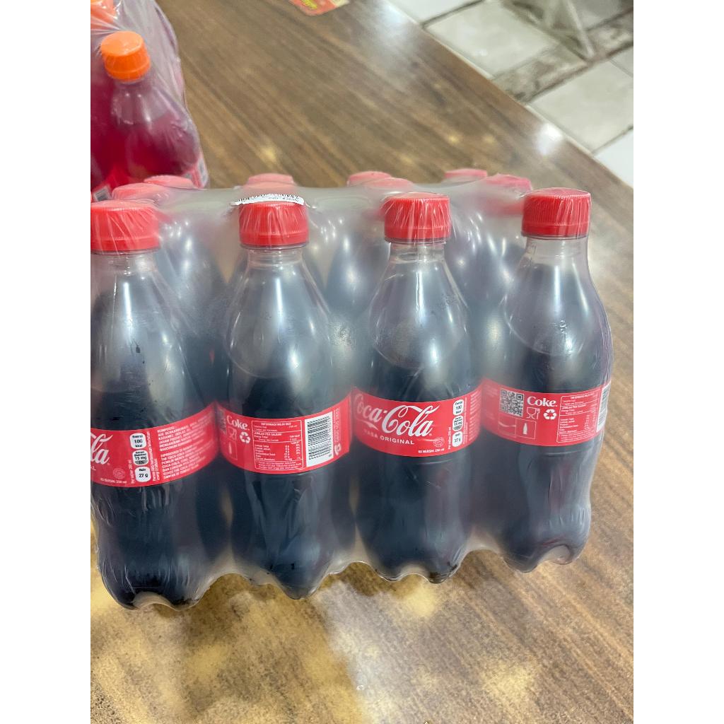 

Minuman bersoda Coca Cola / Fanta / Sprite botol ukuran 250ml