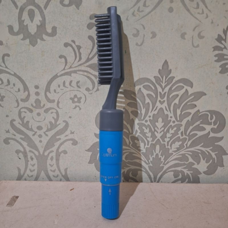 sisir rambut optimum bergetar seken preloved