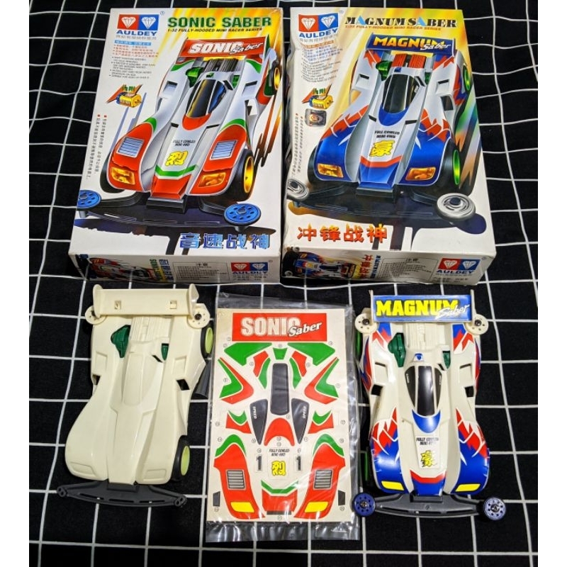 Magnum Saber Auldey + Sonic Saber Auldey