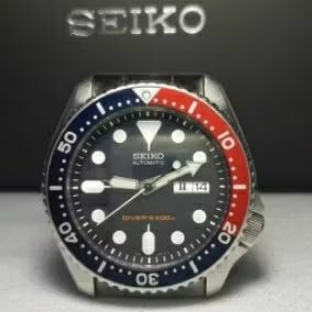 Seiko SKX009K2 PEPSI Black Dial Automatic Diver's 200 M Bracelet Stainless Steel 316 Full Set.