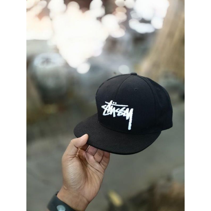 topi second merk stussy