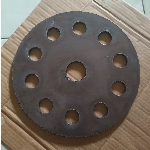 plat besi bulat tebal 10mm , diameter 310mm X lubang tengah 50mm X lubang  kecil 35mm (10buah). 1pcs