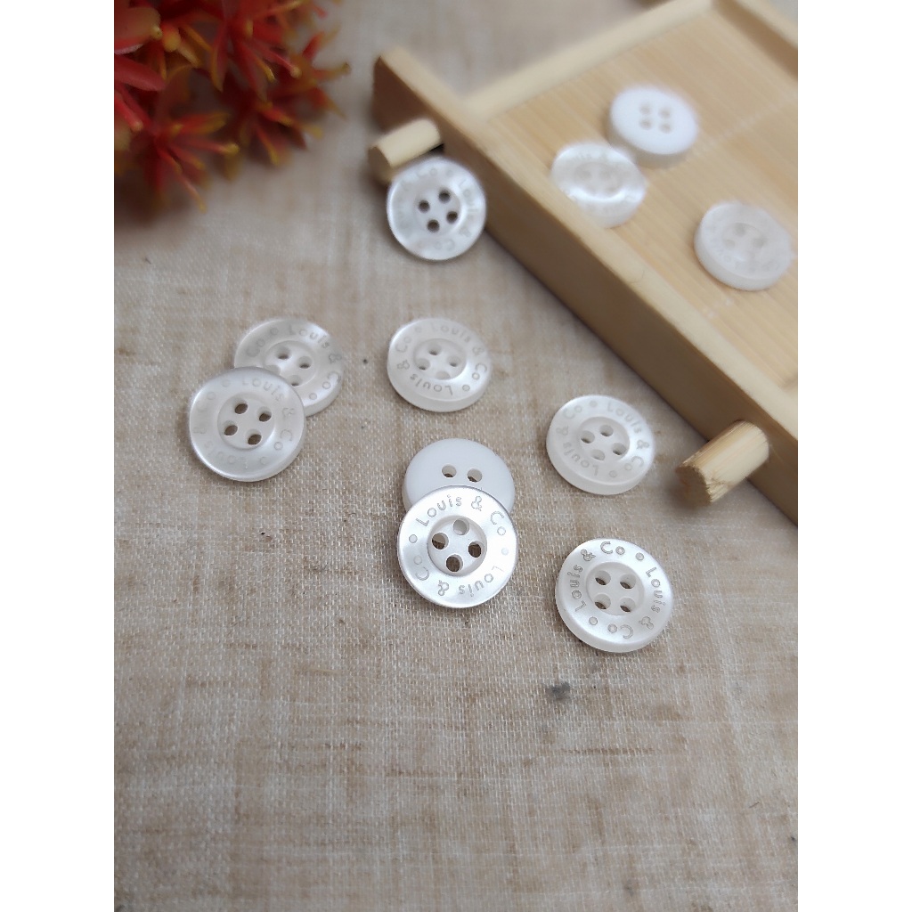 Kancing / Kancing merk /Kancing Grafir /Kancing Baju /Kancing Bening /Kancing Kemeja /Kancing Custom