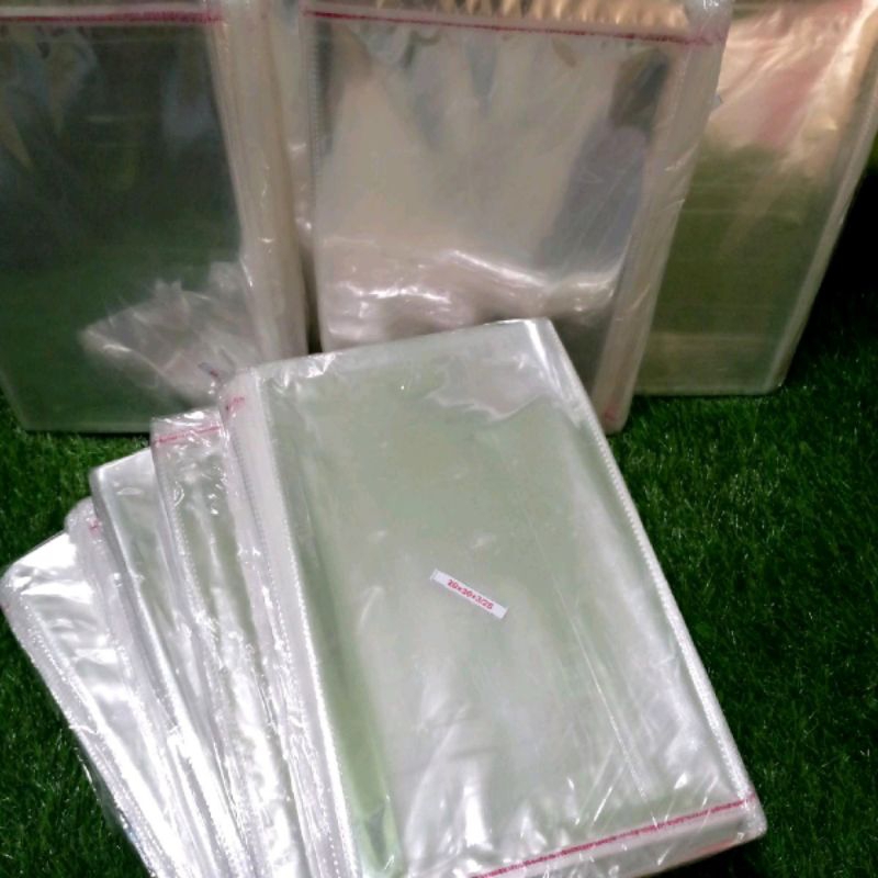 

Plastik opp garment 20x30.23x30.23x35 isi per 100 lembar ketebelan 05 micron