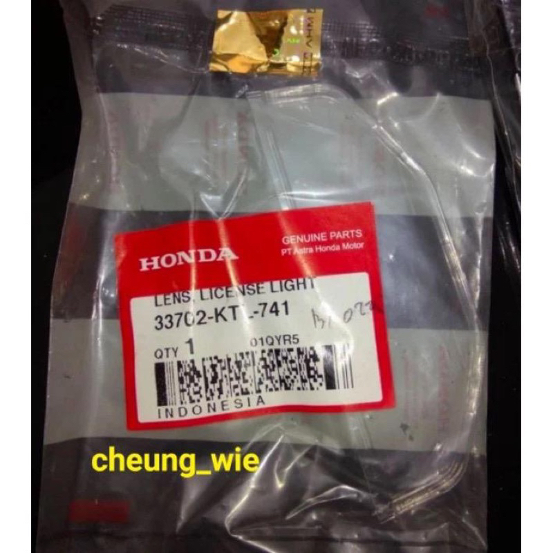33702KTL741 LENS LICENSE LIGHT mika kecil bawah Lampu stop Honda Supra Fit New ori AHM