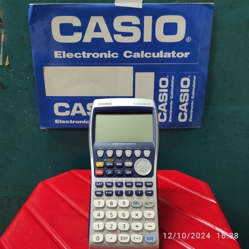 

KALKULATOR SCENTIFIC CASIO CFX 9860 GII SD/GRAFIK CALCULATOR CASIO CFX 9860/DISPLAY ETALASE TOKO/ORIGINAL CASIO