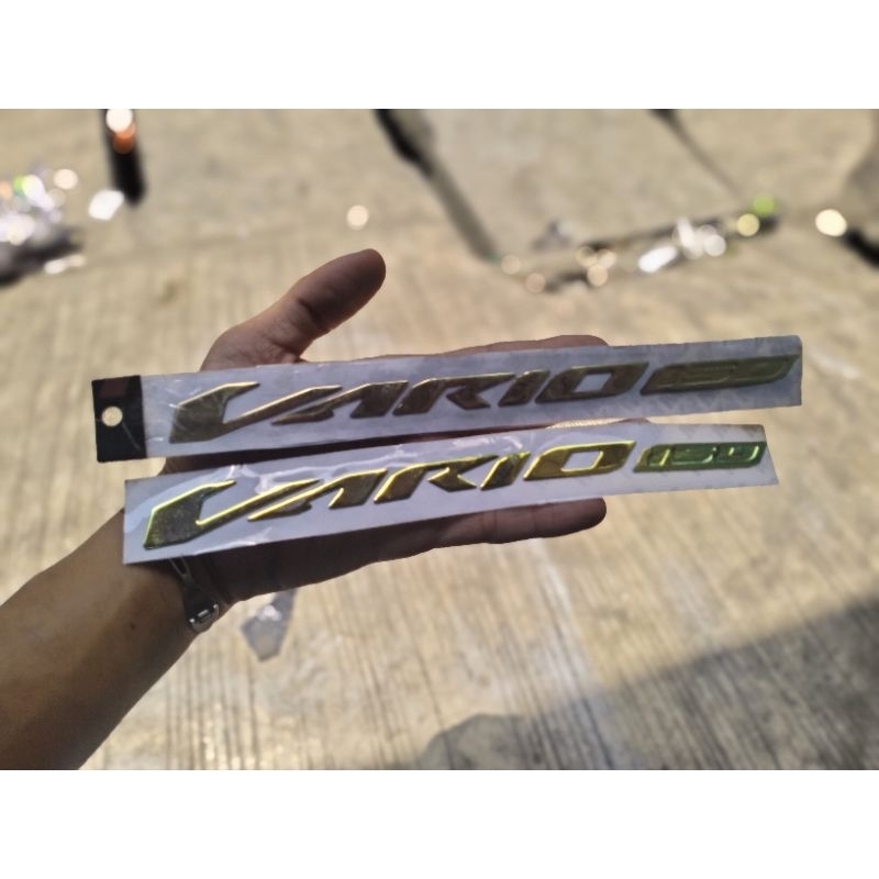 EMBLEM TIMBUL VARIO 150/LOGO TIMBUL VARIO 150