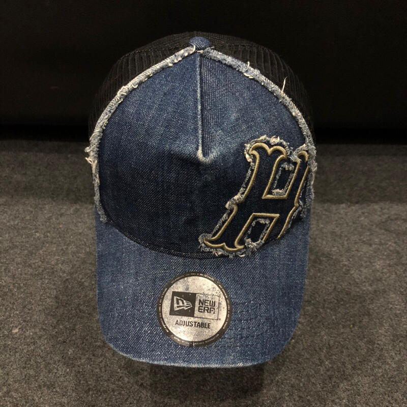 Topi new era model jaring trucker logo H denim second original