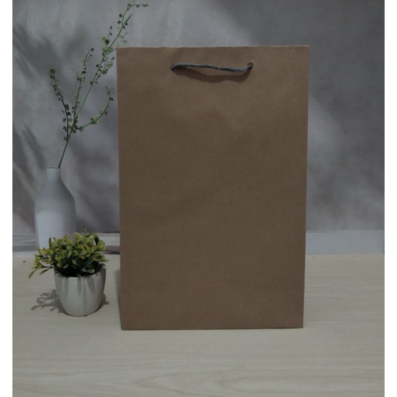 

PAPERBAG SARUNG 20X30 SOUVENIR