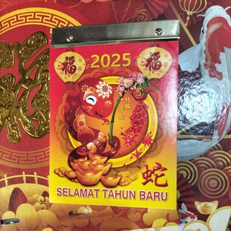 

Kalender Chinese harian sobek Tahun Baru 2025